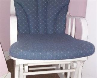 Platform Rocker and Ottoman and baby care changing station and chest of drawers.