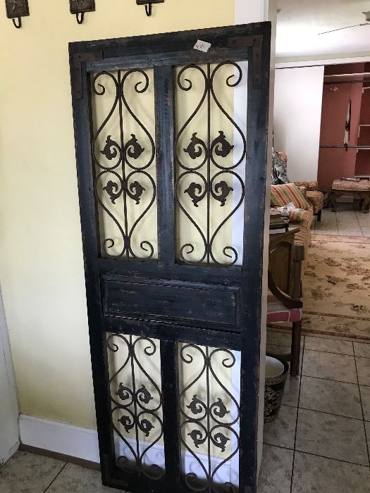 Decorative piece.  Can be a headboard or add screen for a small screen door.