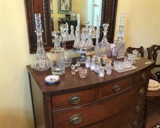 Server/chest with collection of decanters.