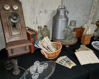 Antique phone, salt cellars , old bottles and jars
