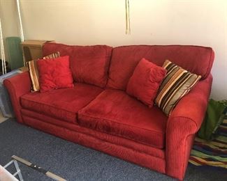 Red Sofa with pillows
