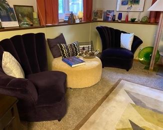 Purple upholstered chairs and ottoman