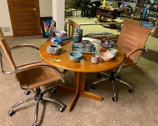 High end leather swivel chairs and table from breakfast nook