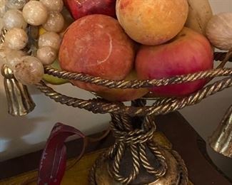 Brass bowl of stone fruit.