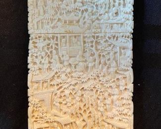 Carved ivory card case with amazing detail.