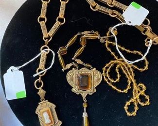 Lovely long Victorian necklace with cameo and locket.  Czechoslovakian style amber necklace with drop.