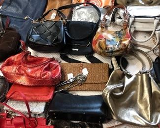 Many fine designer purses and hand bags