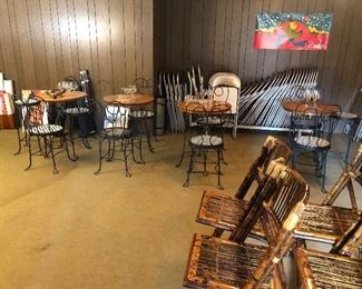 ice cream tables and chairs, many folding chairs, poster not available 