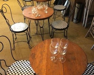 Several sets of antique ice cream tables and chairs