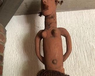 Original label states made in Territory of Papua New Guinea, which dates this wood figure to between 1949-1970