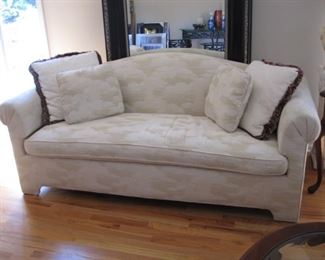 $100.00, Cream Sofa by Kaylin, 74" wide by 33" deep by 26" T