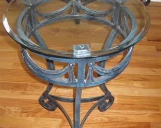 $60.00, Glass top heavy wrought iron side table, 18" tall by 25" across