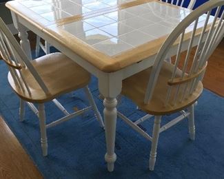 Love this tiled kitchen table and 4 chairs.  Nice little blue rug 5' x 8'.  Majestic Rug Co - India