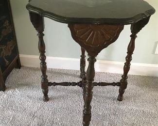 Love this 1940's Table.  Has beautiful legs and unusual connections to table.  Final is in place.  Top needs a little oil or restaining.