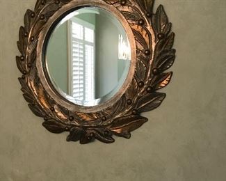 Love this Laurel leaf round mirror with beveled glass