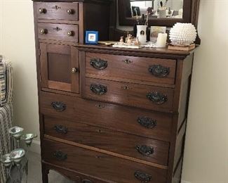 Look at this dresser.  It has been restored beautifully.  Glove drawers. Hot box space, tilt mirror and drawers.  So beautiful.