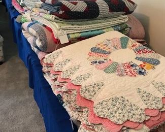 Beautiful quilts of all styles.  Most are hand done, Dresden, Block, Pinwheel etc.  Some are cutters.  All are marked.