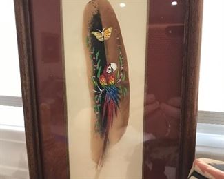 Love this painting on a feather.  Signed