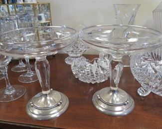 Antique crystal and sterling compotes.