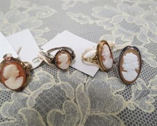 Gold cameo rings.