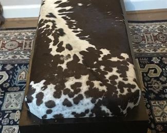 cowhide covered bench