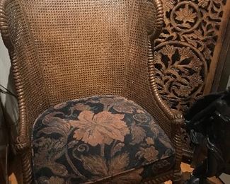 Beautiful caned wing back chair with carved tassels 