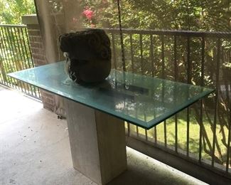 Mid century modern glass top on marble and brass base with sculpted concrete head 