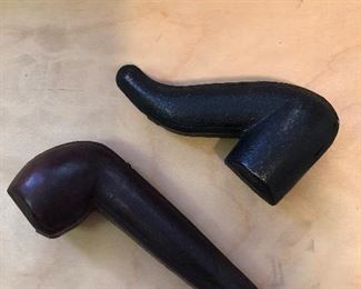 Leather pipe cases. 
