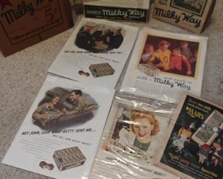 Vintage advertising signs and candy bar boxes