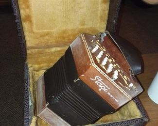 Vintage Stagi accordion with box 
Plays well