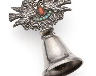 1026
A Matl Dinner Bell
1935-1948; Taxco, Mexico
Applied Matl tag to bell top
Designed by Matilde Poulat, the handle desgined with doves flanking a coral cabochon and turquoise garland
4" H x 3" W; Bell: 1.875" Dia.
73.5 grams
Estimate: $600 - $800