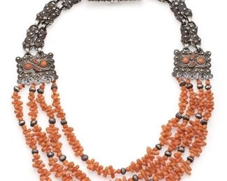 1040
A Matl Sterling Silver Four-Strand Coral Necklace
1934-1948; Taxco, Mexico
Stamped: Matl / 0.925 / Hecho en Mexico
Designed by Matilde Poulat, the four-strand necklace set with coral branches suspended by an ornate double-strand silver necklace set with coral cabochons
18.5" L x 1.25" H
120.0 grams
Estimate: $2,000 - $3,000