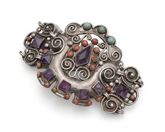 1046
A Matl Silver Gem-Set Bracelet
1934-1948; Taxco, Mexico
Stamped: Matl
Designed by Matilde Poulat, set with amethyst, turquoise, and coral
6.625" C x 2.5" H
97.0 grams
Estimate: $800 - $1,200