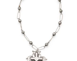 1125
An Antonio Pineda Silver Cross Necklace
1949-1953; Taxco, Mexico
Stamped: Jewels by Antonio; Further stamped: Mexico / Silver / YY473
The stylized cross pendant suspended by a ball and oval link attached neck chain
17" L x 2.25" H x 1.875" W
40.5 grams
Estimate: $700 - $900