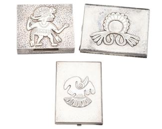 1124
Three Graziella Laffi Silver Cases
Third-quarter 20th Century; Peru
Each stamped: Laffi / Peru / Sterling or 925
Each with a hammered ground, comprising a humidor with figural motif (3.325" H x 3.75" W x 1" D), a case with applied bird (4.75" H x 3.25" W x .325" D), and a case with applied feather and snake (4" H x 3/125" W x .325" D), 3 pieces
450.5 grams
Estimate: $400 - $600