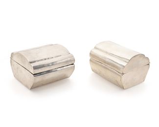 1133
Two William Spratling Sterling Silver Boxes
1940-1944; First Design Period; Taxco, Mexico
Each stamped for William Spratling / Sterling: Spratling Silver
Each sterling silver vanity box with hinged and scalloped 'pillow' lid, 2 pieces
Each approximately: 2.375" H x 3.25" W x 3" D
13.255 oz. troy approximately
Estimate: $800 - $1,200