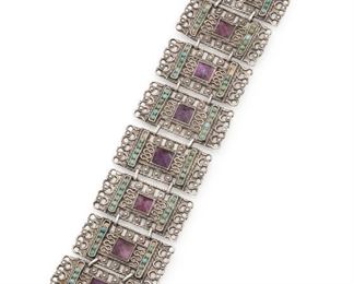 1151
A Matl Sterling Silver Link Bracelet
1950-1960; Taxco, Mexico
Etched: Matl / m.regis / 142093 / Mexico / 925
The repeating links set with turquoise and amethyst
7" L x 1.5" H
50.5 grams
Estimate: $800 - $1,200