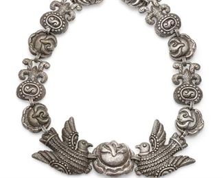 1152
A Matl Silver Necklace
1935-1948; Taxco, Mexico
Signed to plaque: Matl
Designed by Matilde Poulat, the silver necklace in a birds and roses motif
19" L x 1.875" H
184.5 grams
Estimate: $800 - $1,200