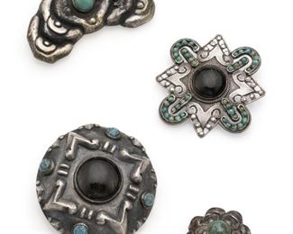 1155
Four Matil Gem-Set Jewelry Items
1934-1940, 1934-1948, and third-quarter 20th Century; Taxco, Mexico
Each stamped for Matl; One stamped: Salas
Three designed by Matilde Poulat, comprising an obsidian and turquoise repousse brooch (2" Dia.), a turquoise and repousse brooch (1.5" H x 2.325" W), a floriform clip (1.125" Dia.), and an obsidian, glass and turquoise stylized quatrefoil brooch (2" H x 2" W), 4 pieces
75.5 grams
Estimate: $500 - $700
