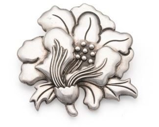 1181
An Antonio Pineda Silver Flower Brooch
1953-1979; Taxco, Mexico
Crown mark for Antonio Pineda; Eagle 17; Further stamped: Silver / Made in Mexico / PR248
Designed as a stylized flower
2.875" H x 3" W
50.0 grams
Estimate: $300 - $500
