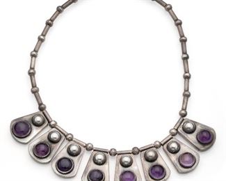 1190
A Rafael Dominguez Silver And Amethyst Necklace
Pre-1948; Taxco, Mexico
Stamped: Taxco / 980 / RD
The ball and rod bead neck chain suspending amethyst-set fringe
16.5" L x 1.25" H
113.0 grams
Estimate: $400 - $600