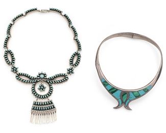 1216
Two Mexican Silver Jewelry Items
Fourth-quarter 20th Century; Taxco, Mexico
Each stamped: 925 / Mexico; Each further stamped for maker
Comprising a bib necklace set with synthetic turquoise (21.25" L x 4.5" H) and a rigid collar necklace with turquoise-colored enamel and malachite (16" C x 1.5" H), 2 pieces
223.0 grams
Estimate: $500 - $700