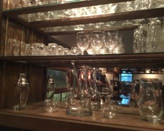 Bar area with Martini shaker, pitcher and glasses - other glasses for various drinks