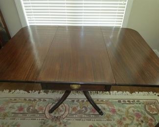 MAHOGANY DROP LEAF TABLE.