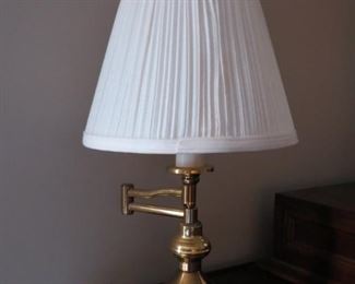 PAIR OF SWING ARM BRASS LAMPS.