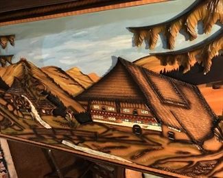 3-4feet long, 3D wood carved picture with either lighting or sound--haven't tried it. Perfect condition