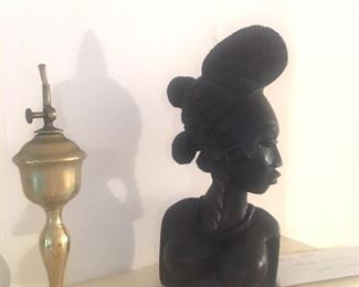Brass oil lamp; ebony sculpture