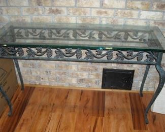 Verdigris green cast iron side table with glass top