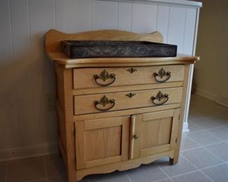 This is an Antique Dry Sink in Wonderful Condition. It has been stripped but the there is no mistaking this piece as a 19th Century piece.