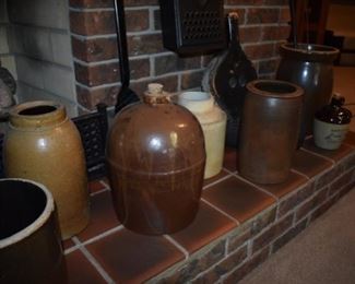 More Antique Crocks, the 5th one from left (brown) is embossed on the front with one of the first Crockery makers in Ky.
